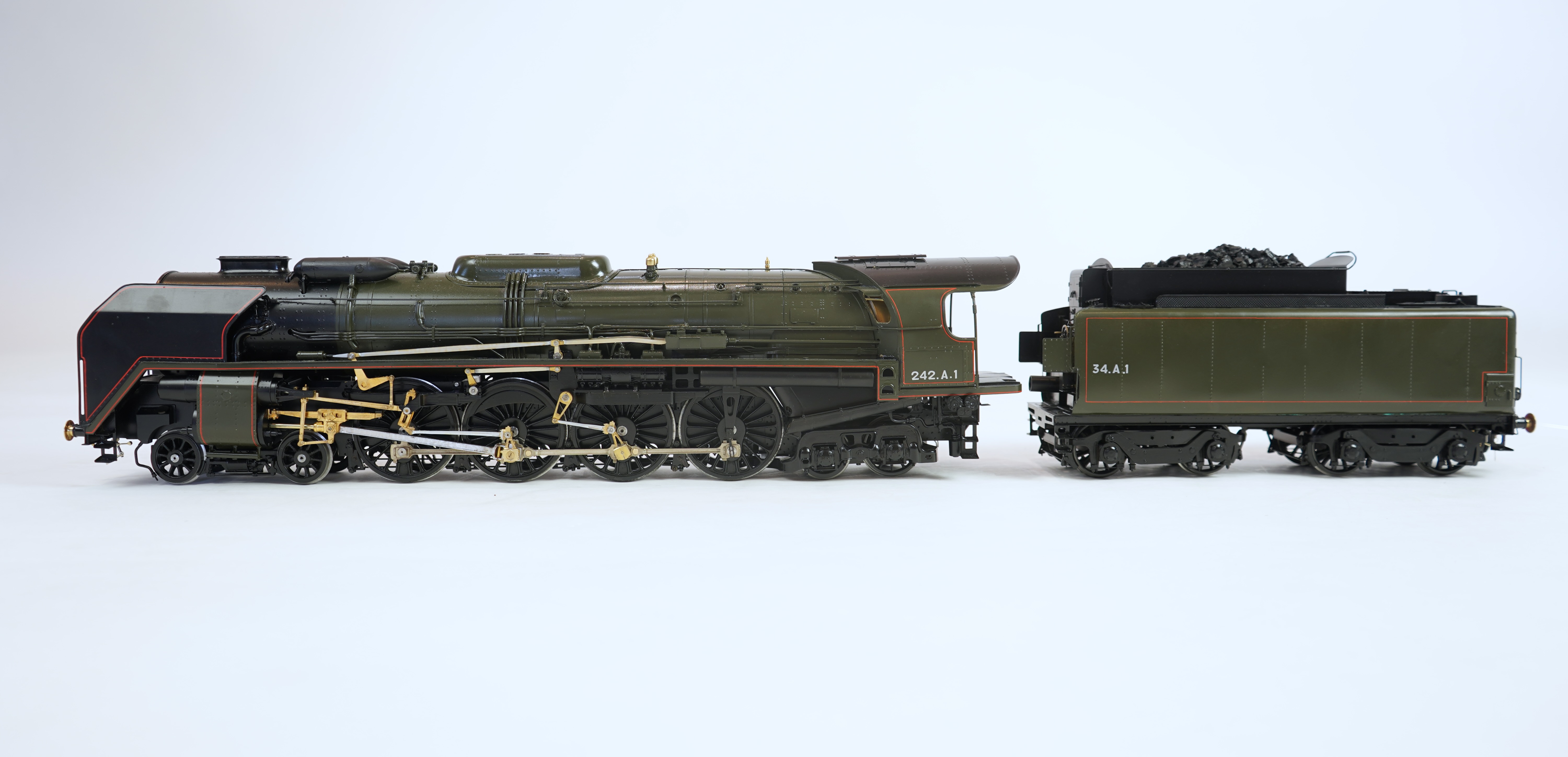 A Gauge One exhibition quality scratch built model of Andre Chapelon’s iconic SNCF 242.A.1, 2-4-2 tender locomotive, built by the Finescale Locomotive Company (under Neil Rose) from a commission.